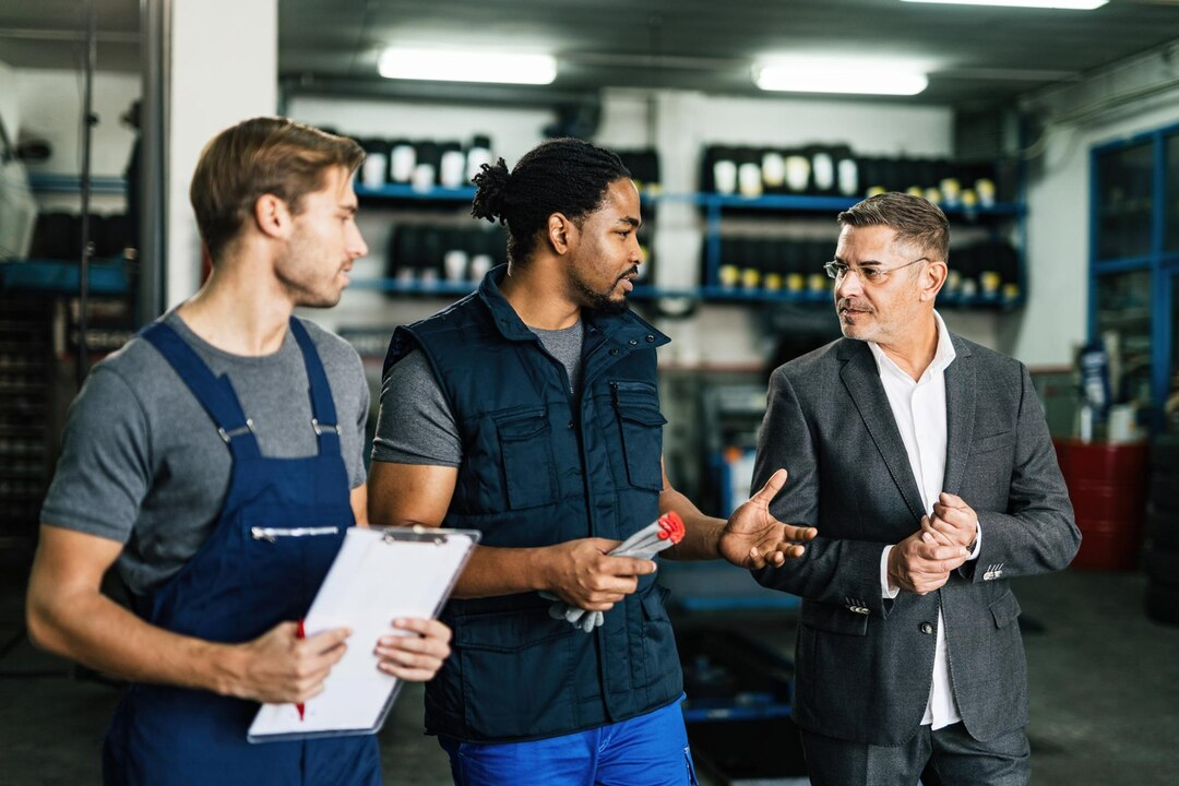 People working in a garage